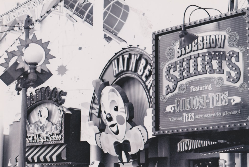 a black and white photo of a fairground