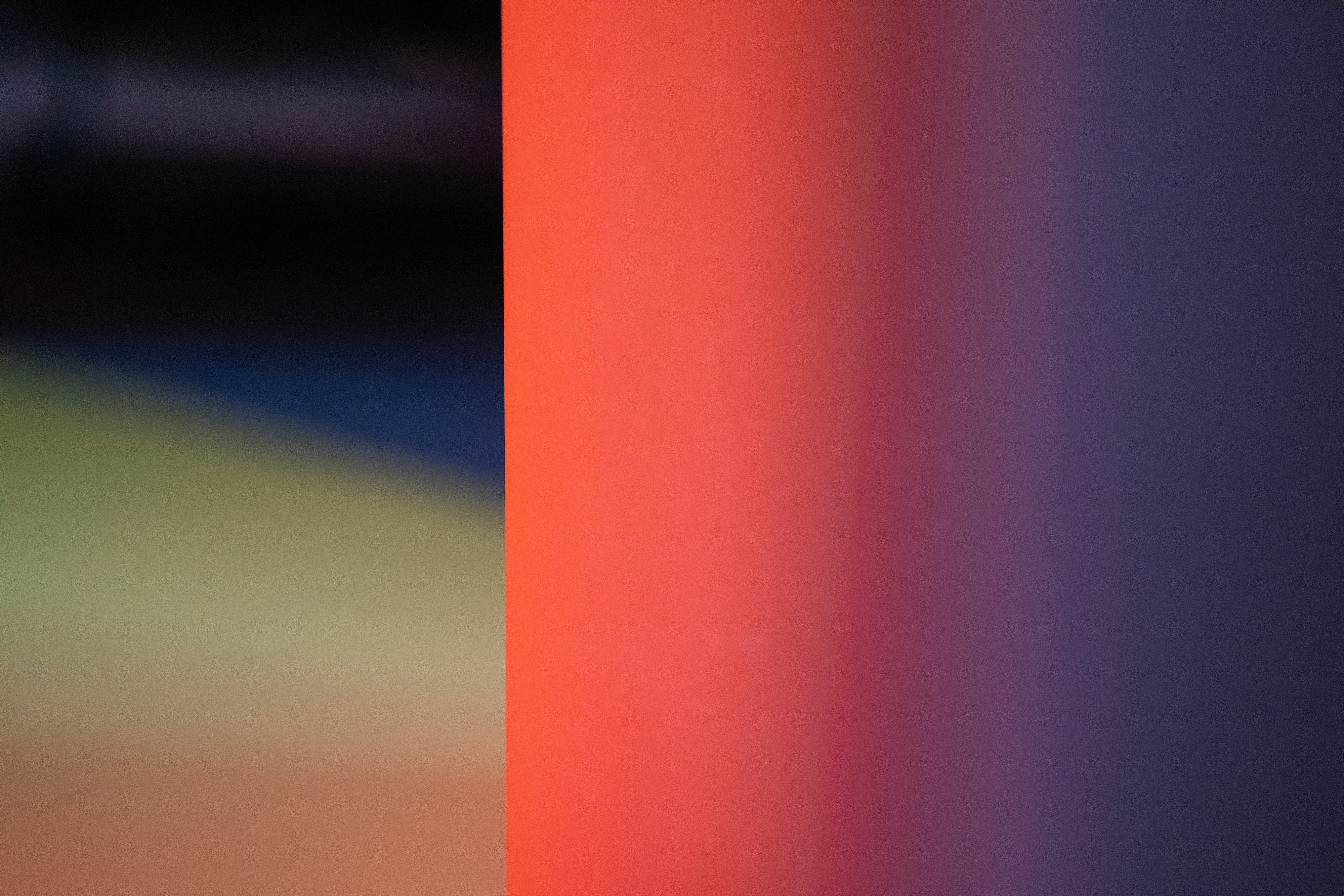 a blurry photo of a cell phone with a blurry background