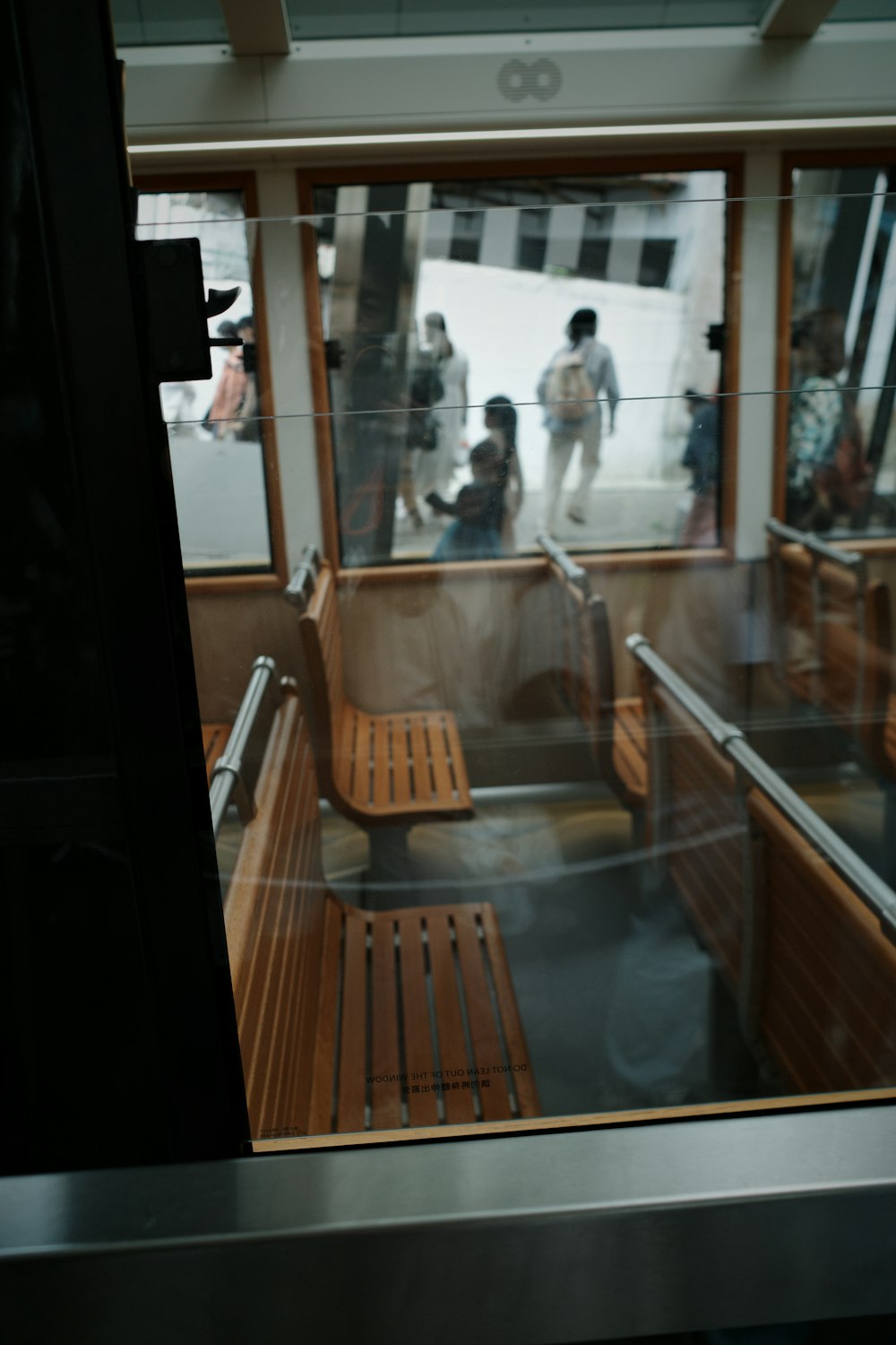 a group of people riding on a train next to each other