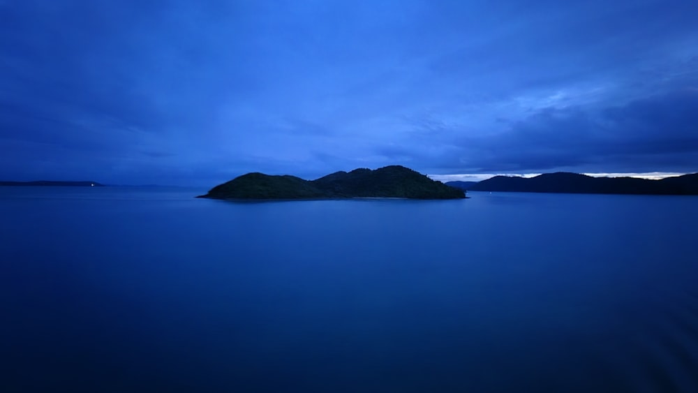 a small island in the middle of a large body of water