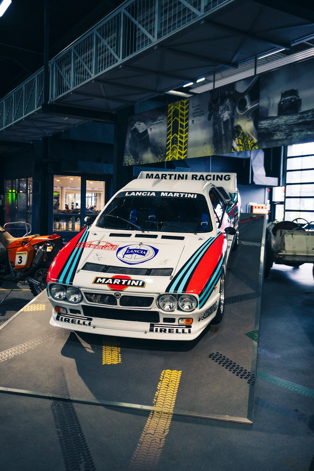 a car is on display in a museum