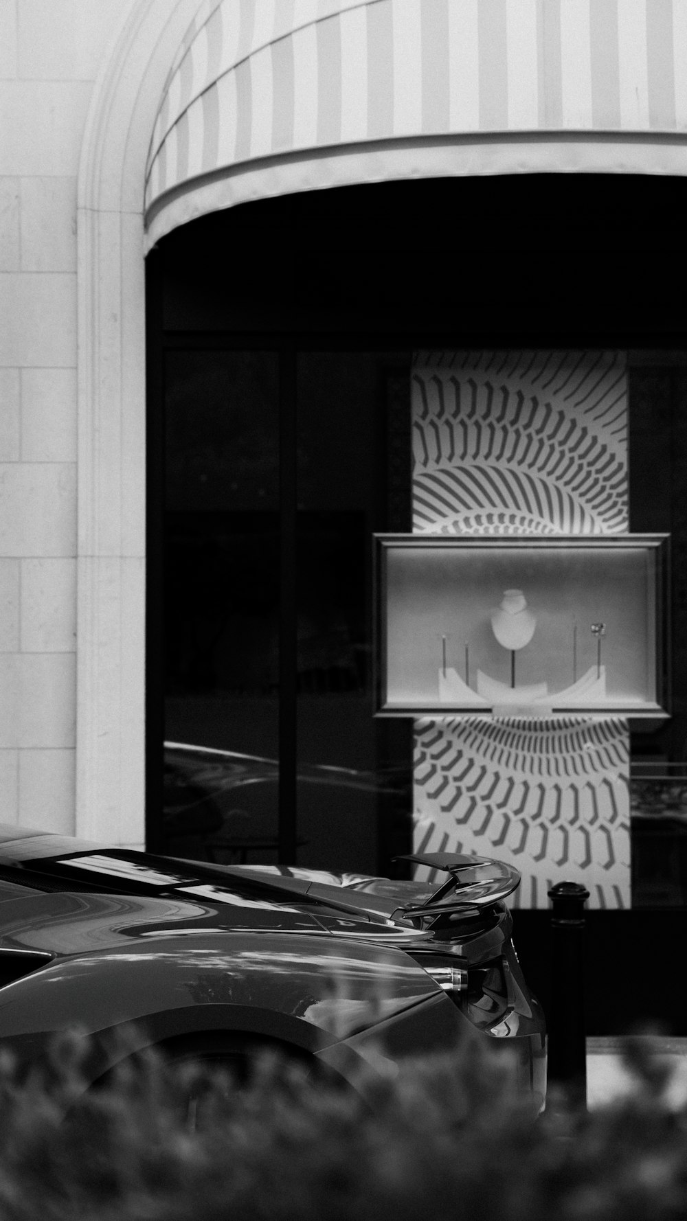 a black and white photo of a store front