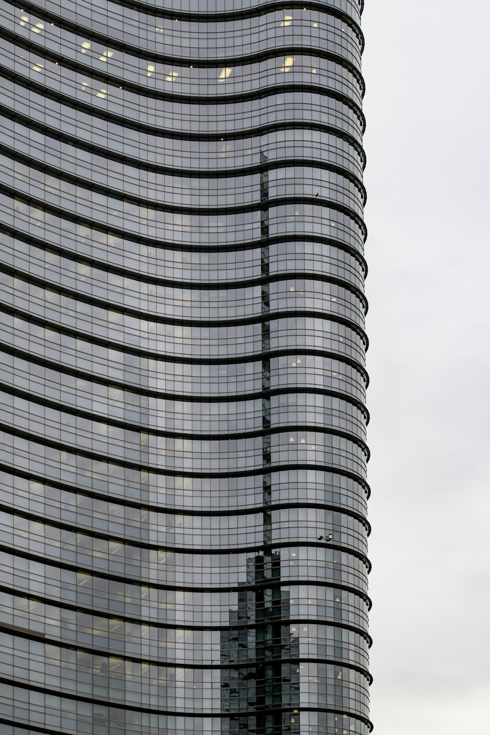 a very tall building with a clock on it's side