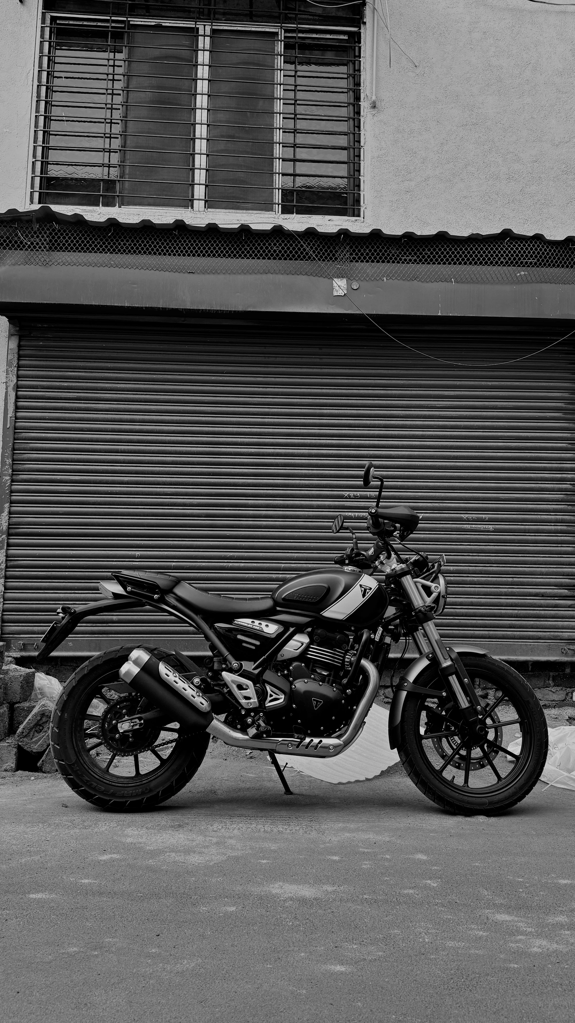 Triumph Scrambler motorcycle on the road