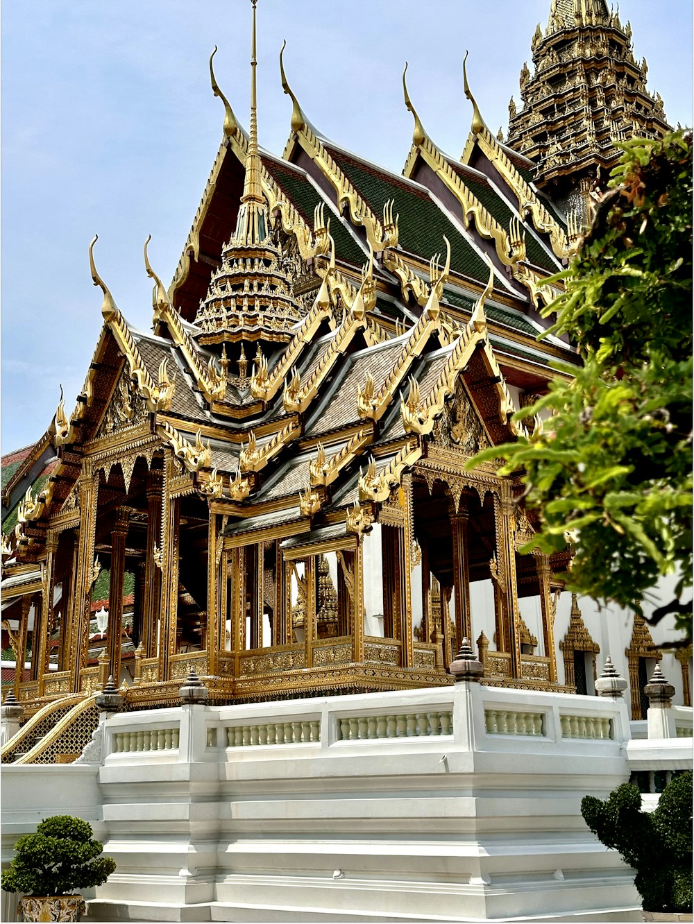 a building with a lot of gold decorations on top of it