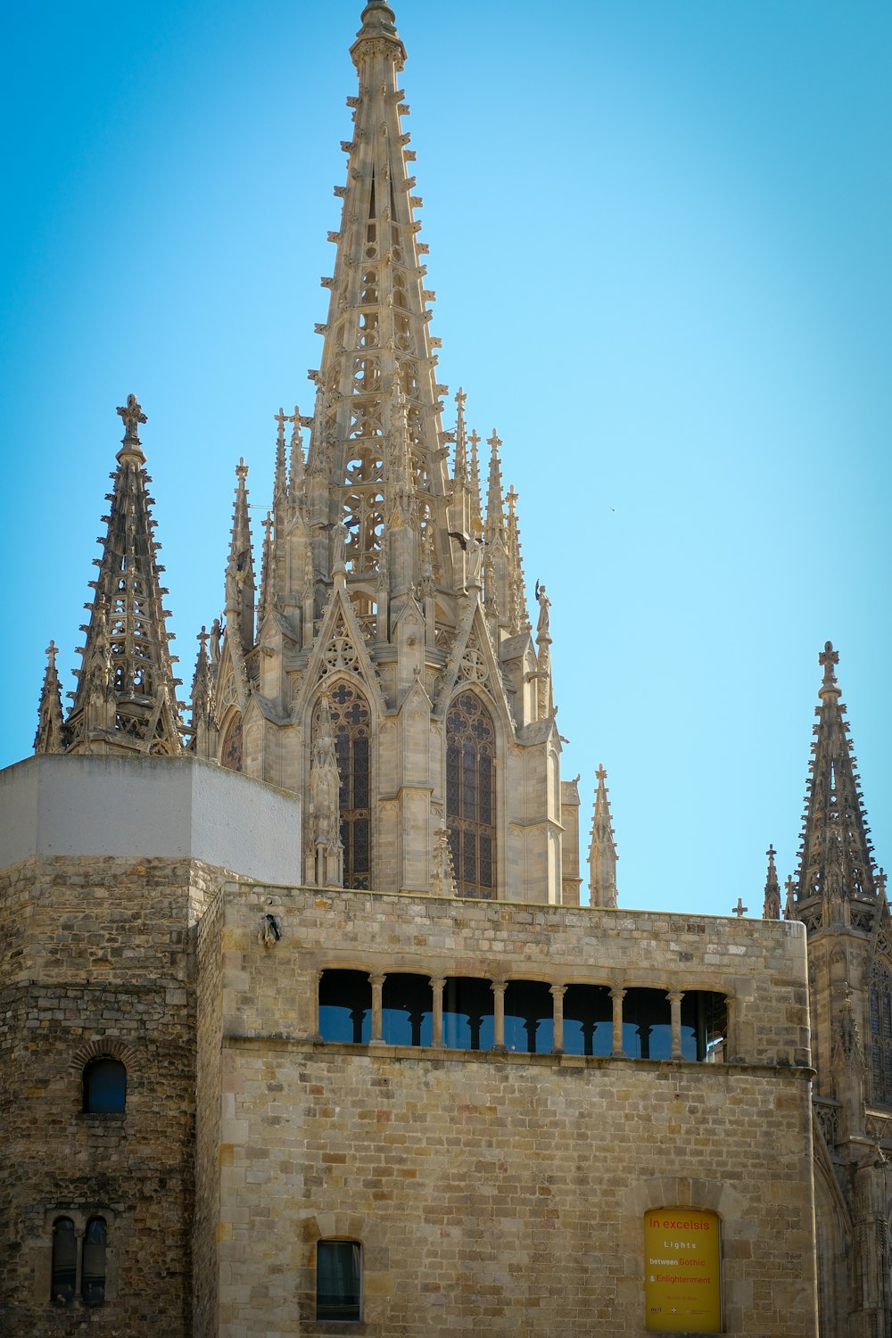 a very tall building with a clock on it's side