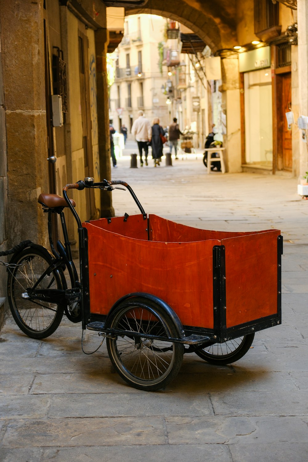 a bike with a trailer attached to the back of it