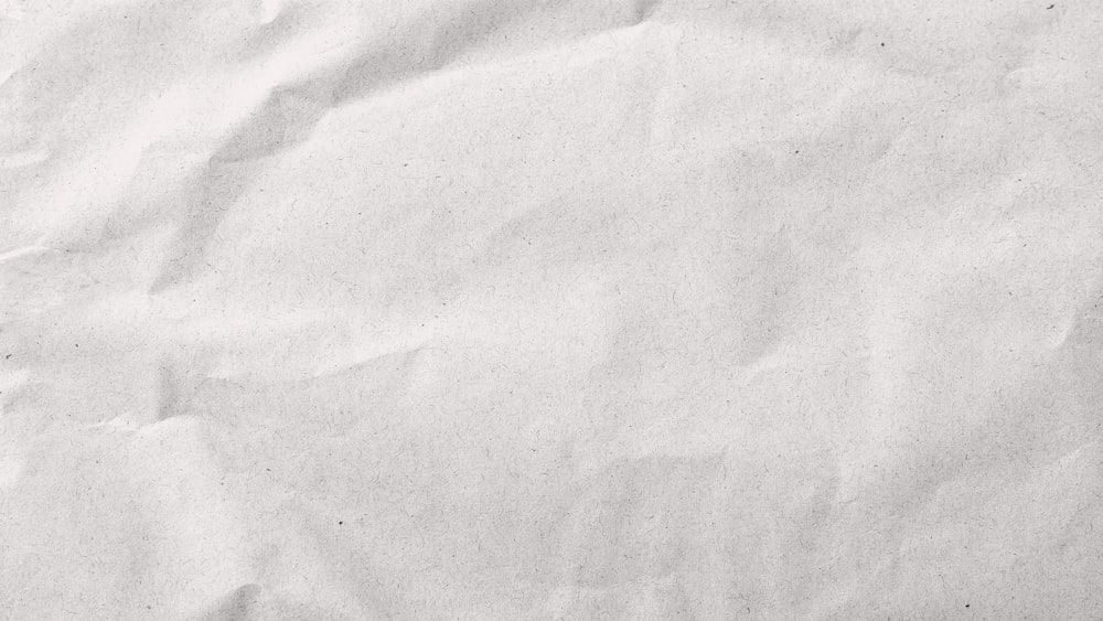 a close up of a piece of white paper