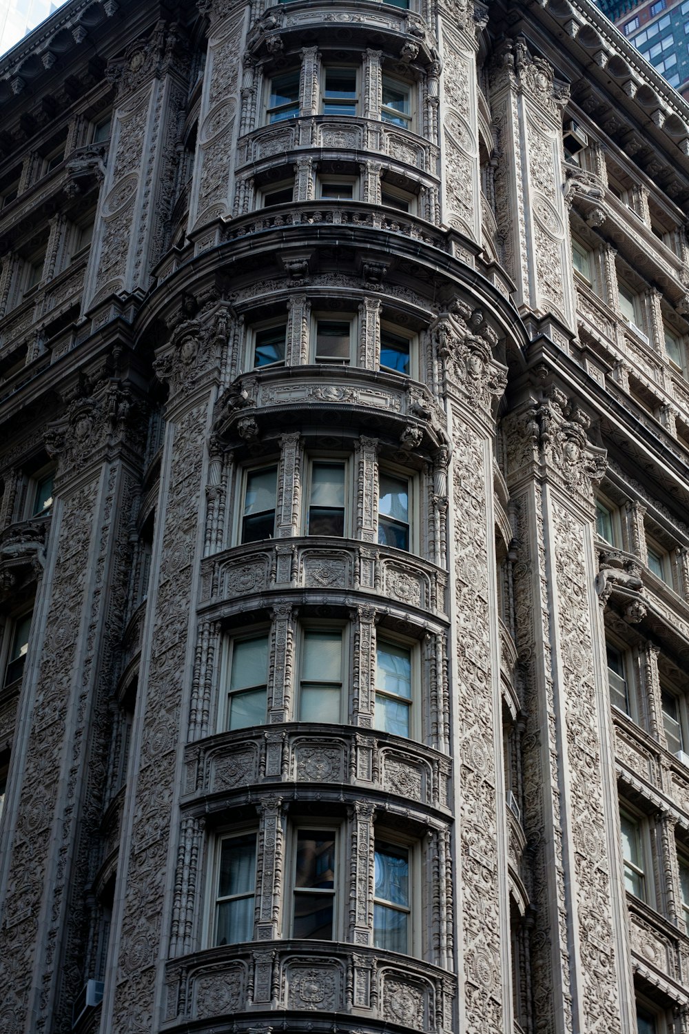 a tall building with a clock on the top of it