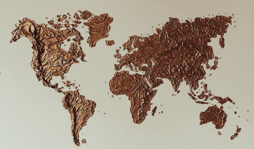 a map of the world made out of chocolate crumbs