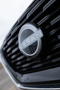 a close up of the front grille of a car