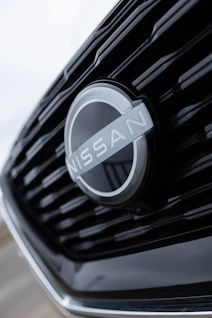 a close up of the front grille of a car