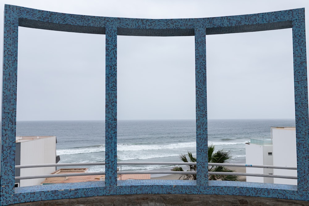 a view of the ocean through a window