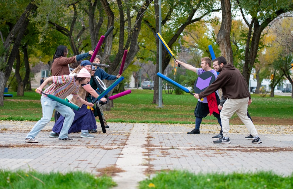 a group of people playing a game of baseball