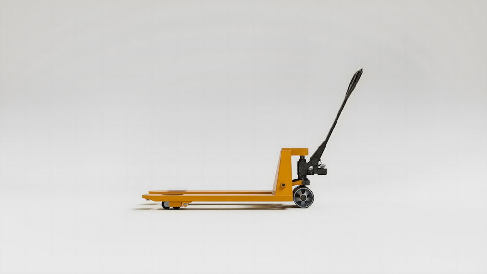 a small yellow scooter on a white background