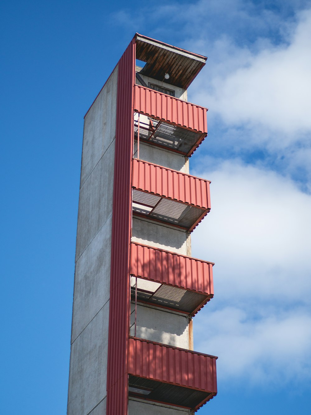 a tall building with a clock on the top of it