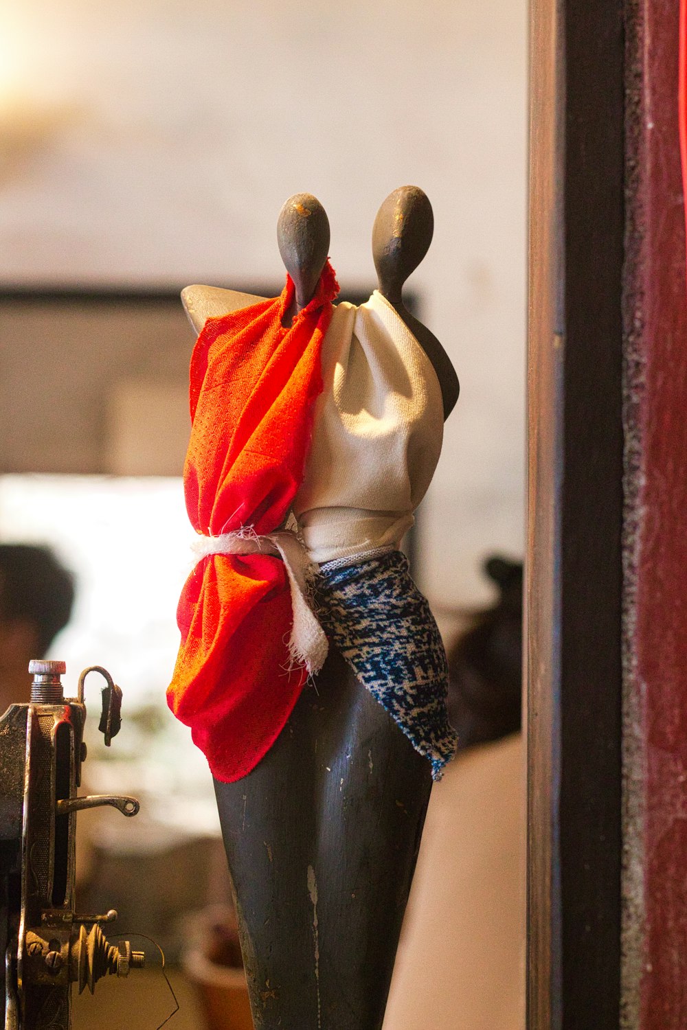 a close up of a sewing machine with a cloth on top of it