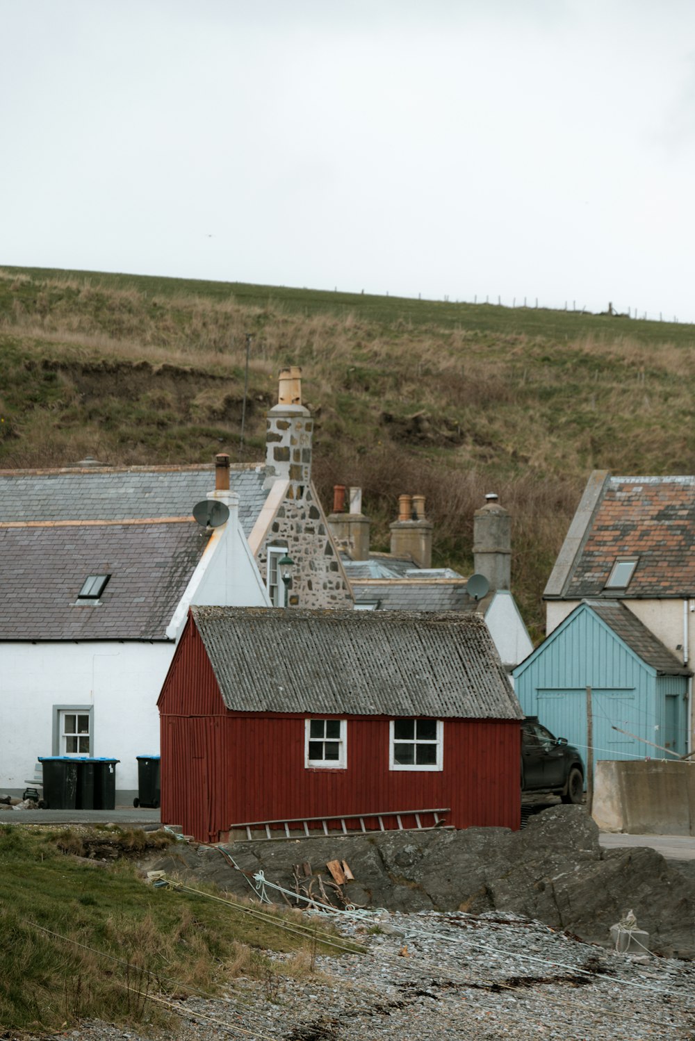 a small red house with a red roof