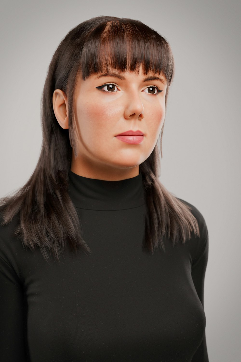 a woman in a black shirt is posing for a picture