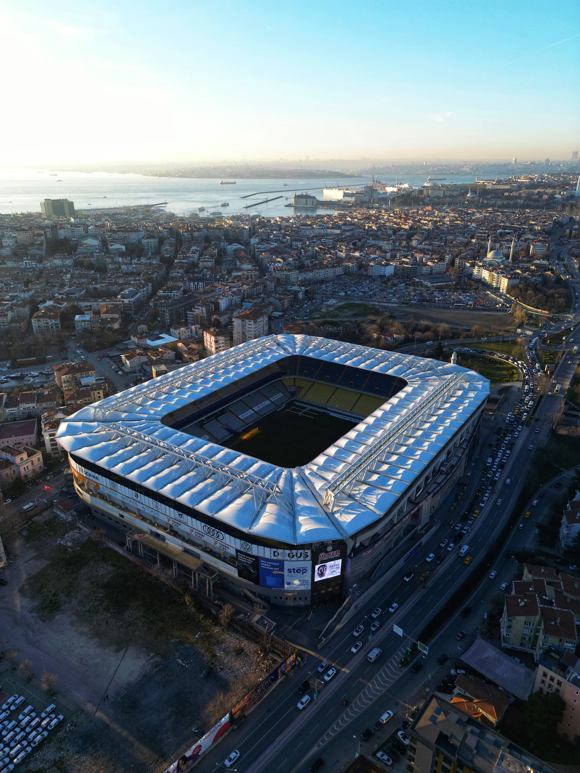 an aerial view of a soccer stadium in a city