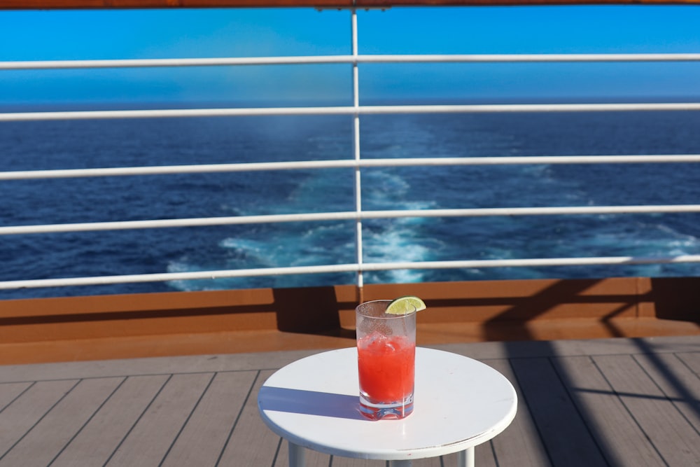 a drink on a table on a cruise ship