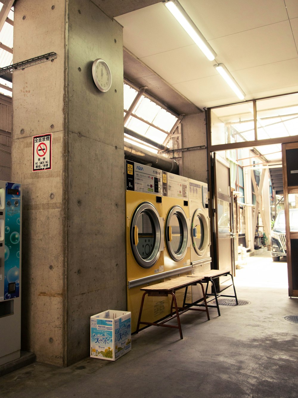 a washer and dryer in a large room