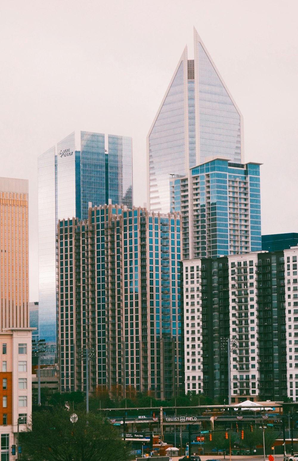 a group of tall buildings sitting next to each other