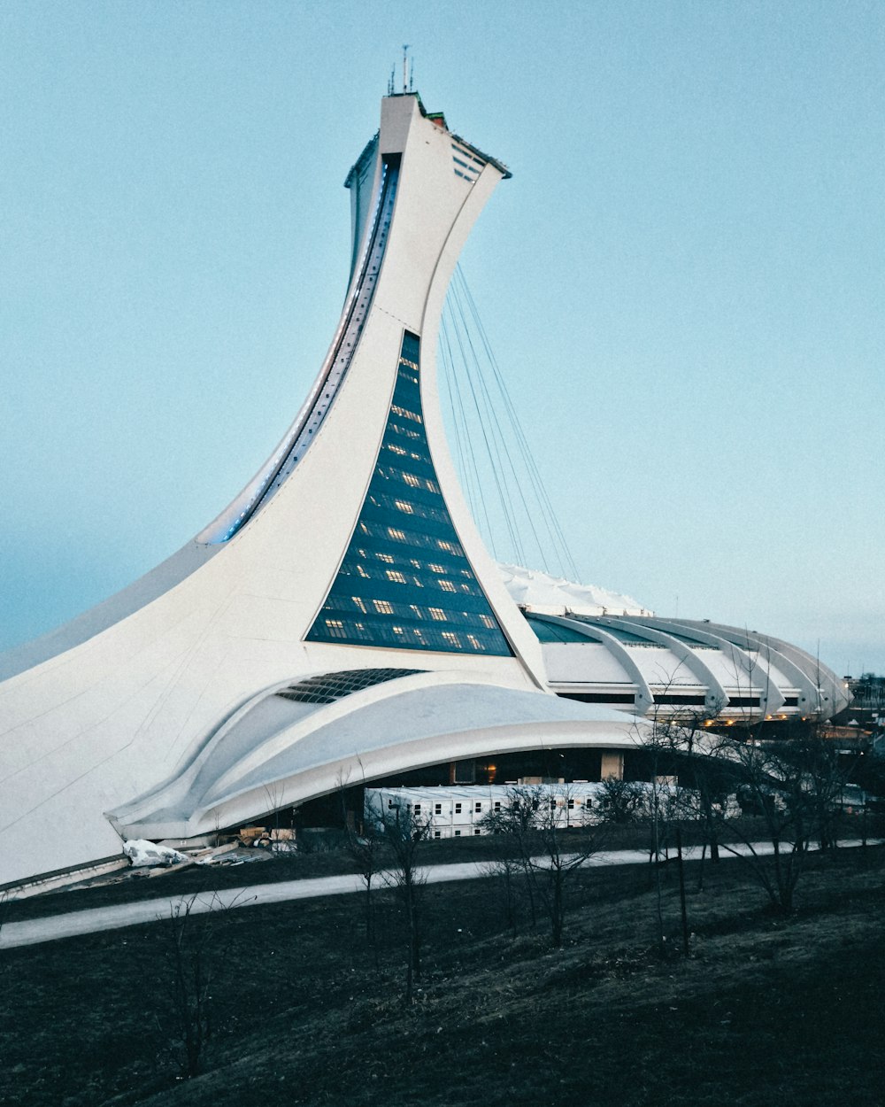 a large white building with a curved roof