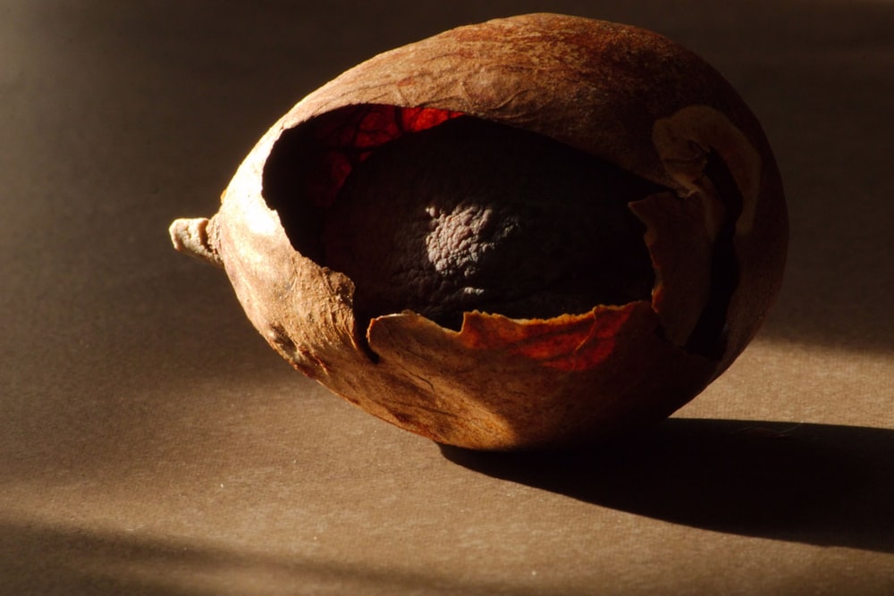 a piece of fruit that is sitting on a table