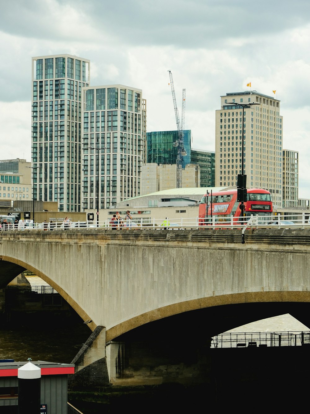 a bridge over a river with a train on it