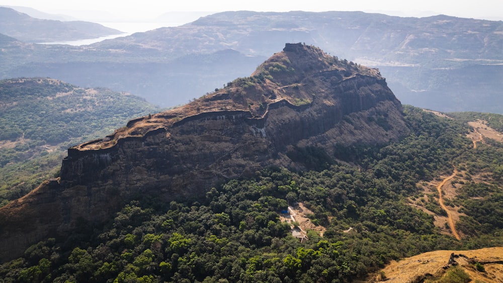 a view of a mountain with a castle on top of it