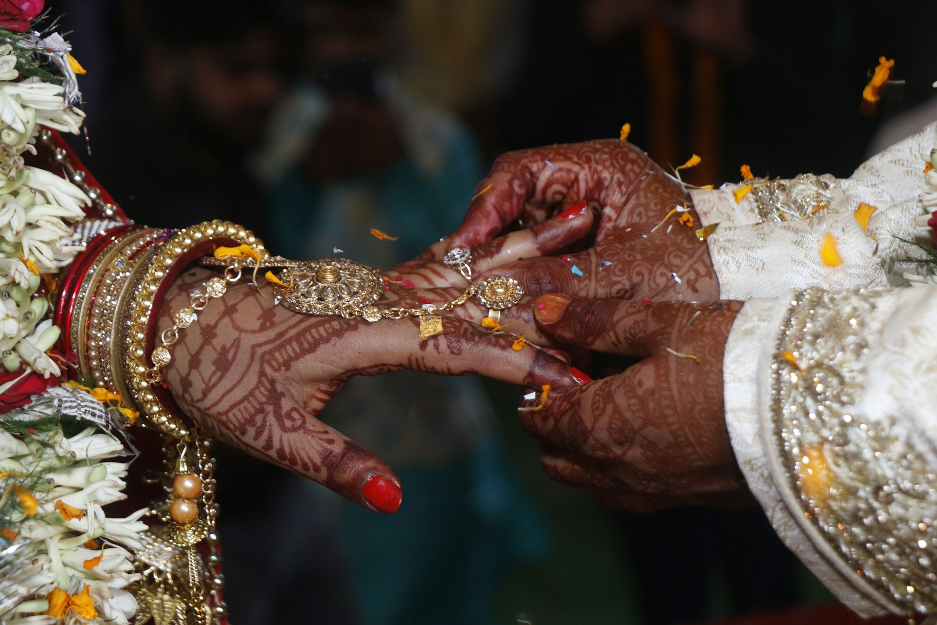 a close up of a person holding another person's hand