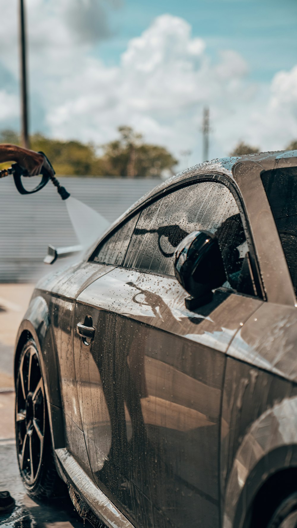 a car being washed with a car wash machine