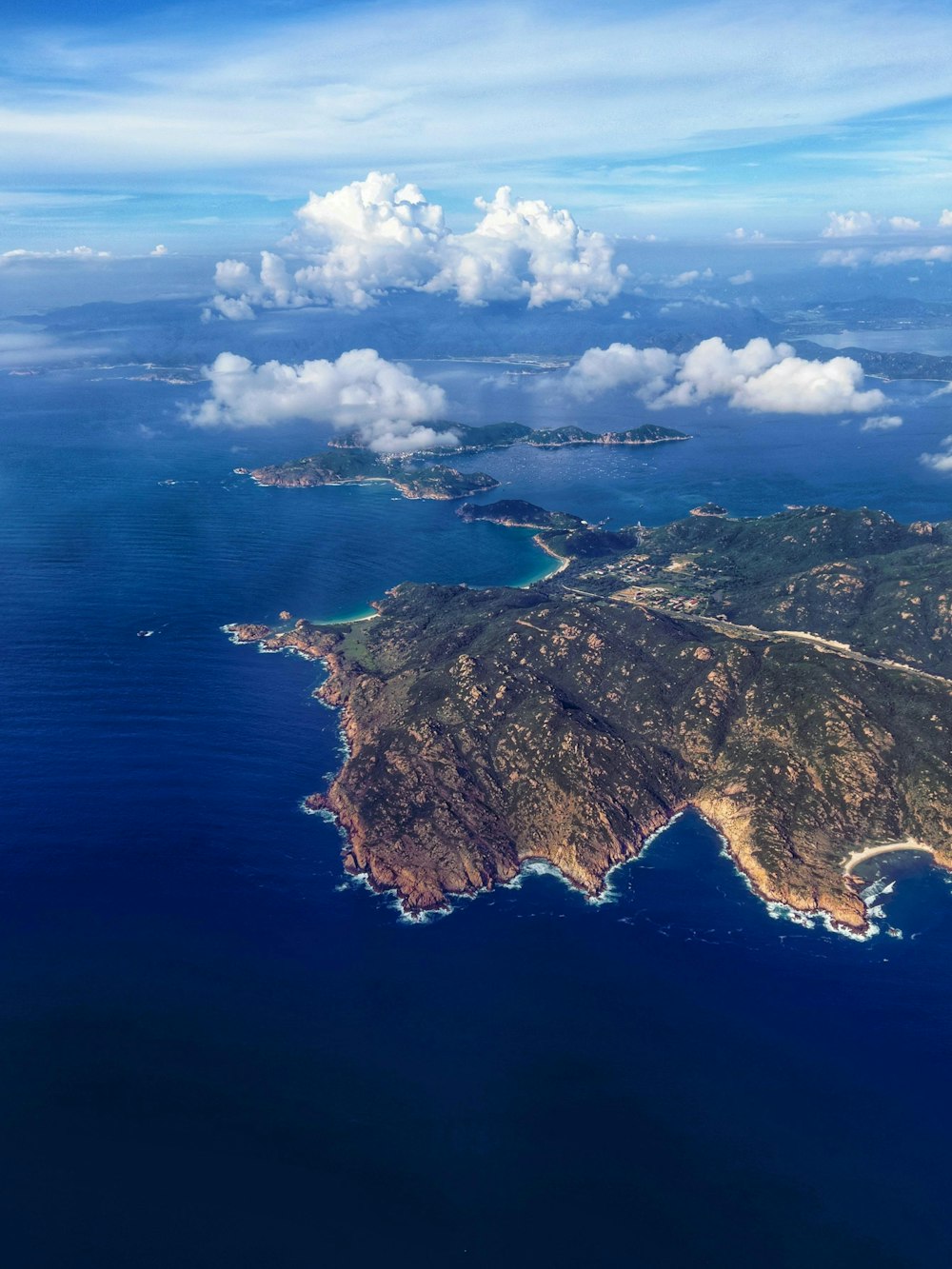 an aerial view of an island in the ocean