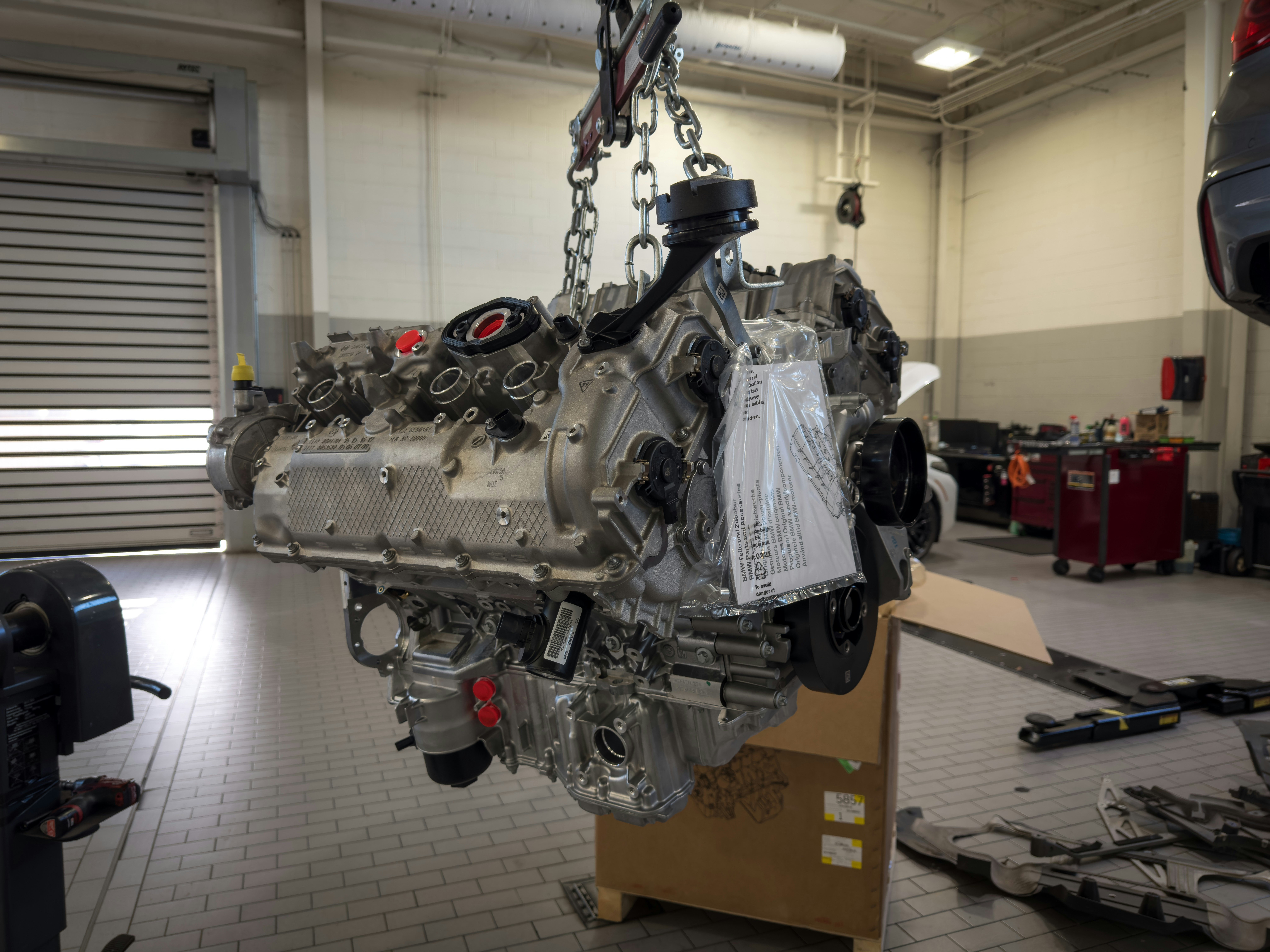 a car engine being worked on in a garage