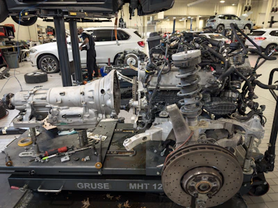 the engine of a car is being worked on