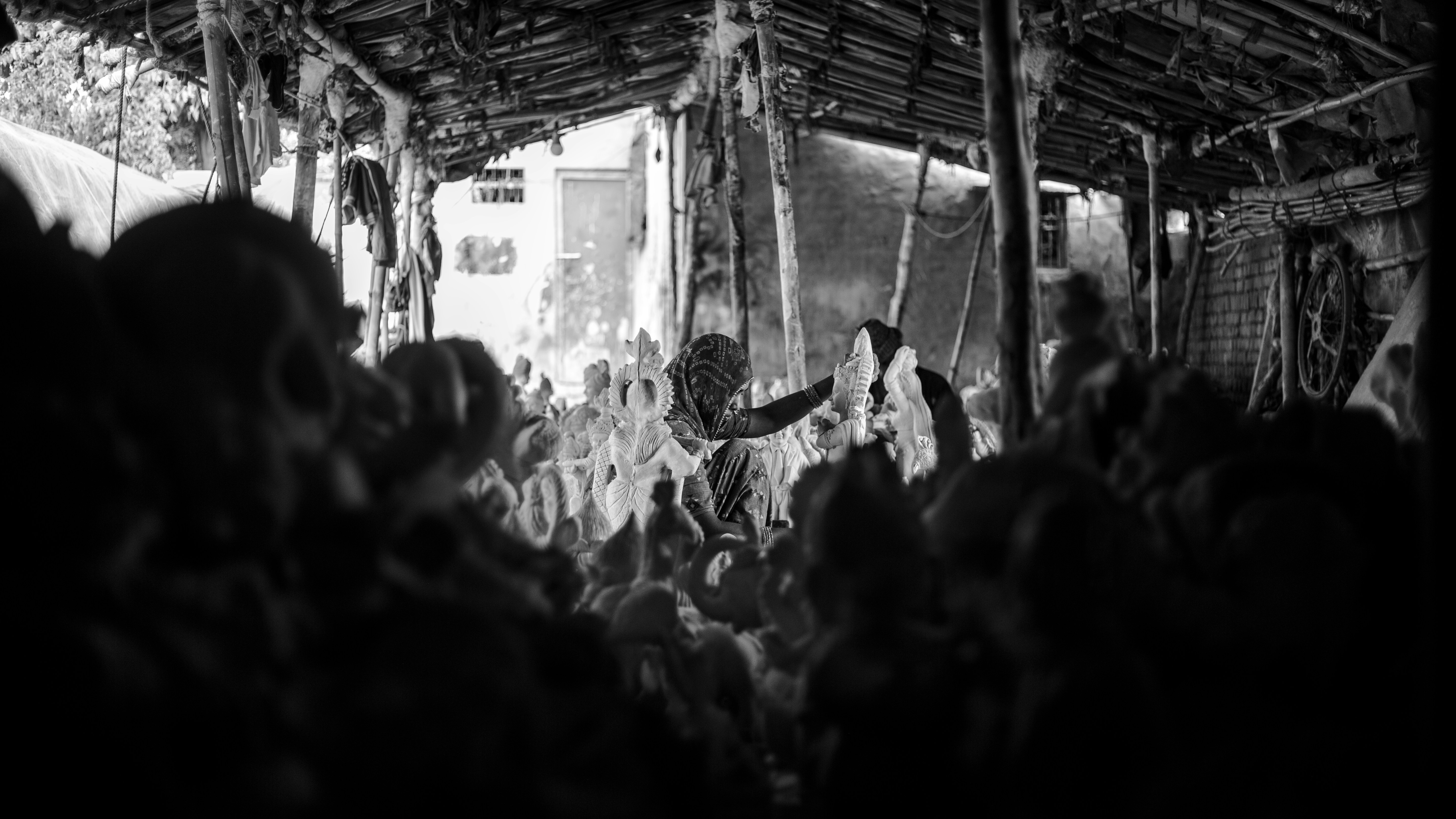 a black and white photo of a crowd of people