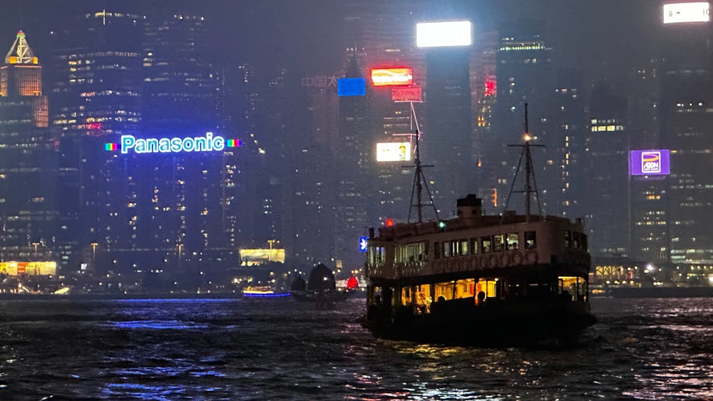 a large boat floating on top of a body of water