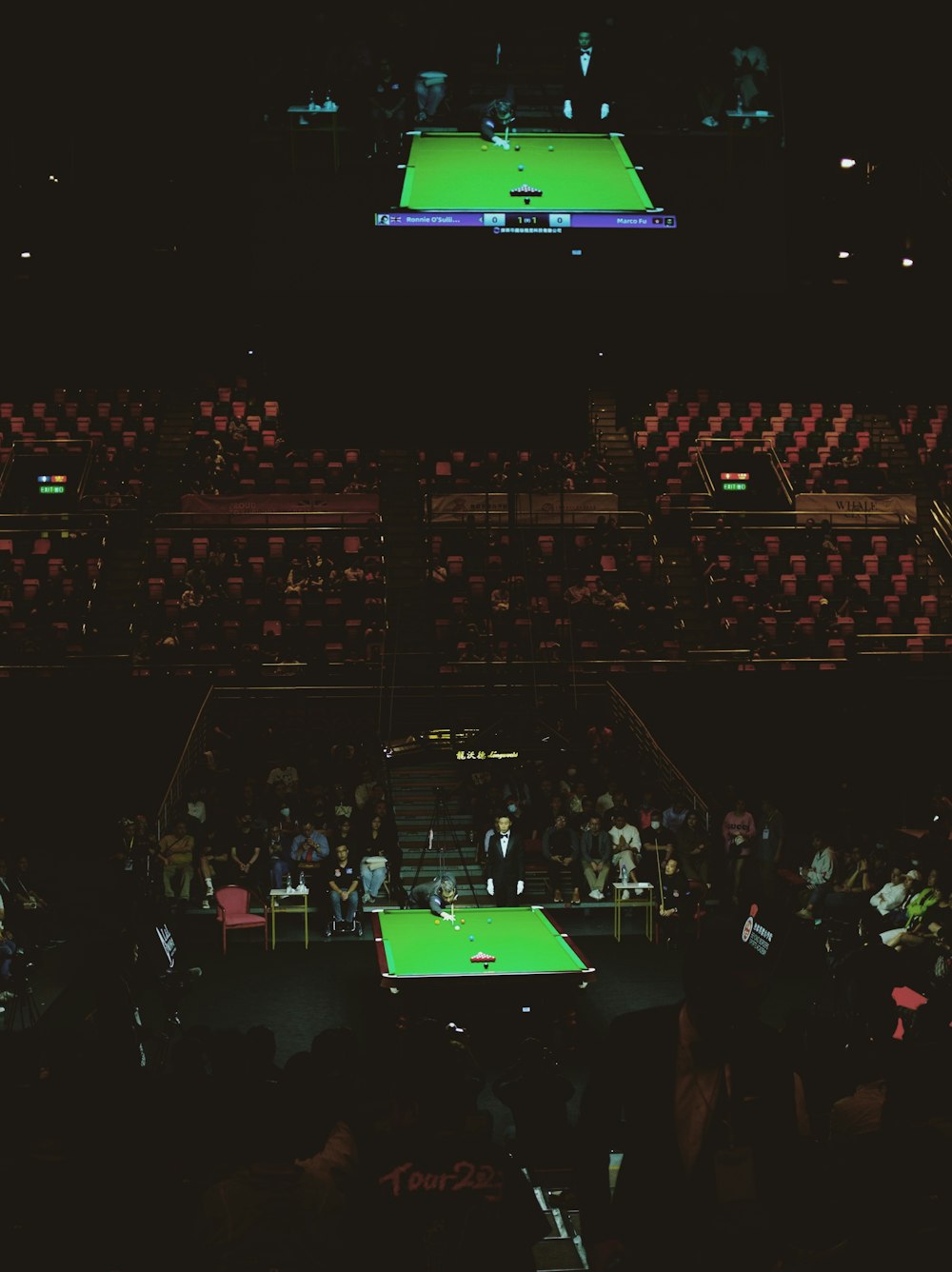 a tennis court with a green court in the middle of it
