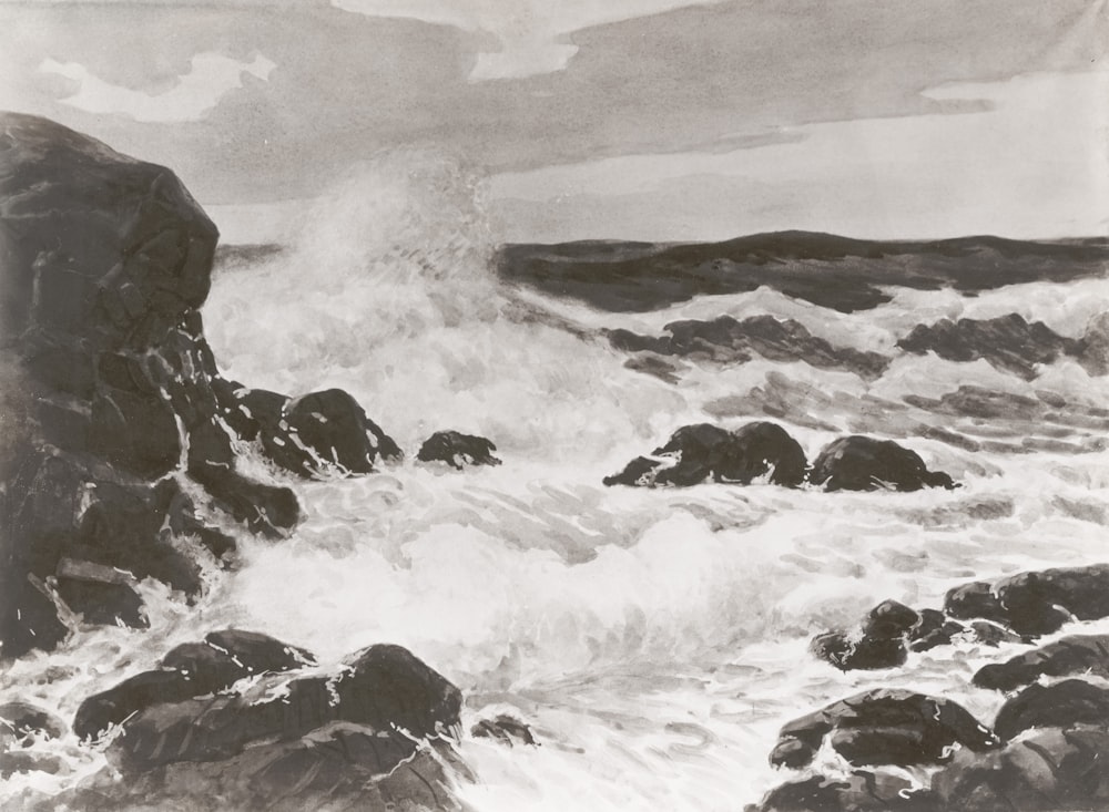 a black and white photo of a wave crashing over rocks