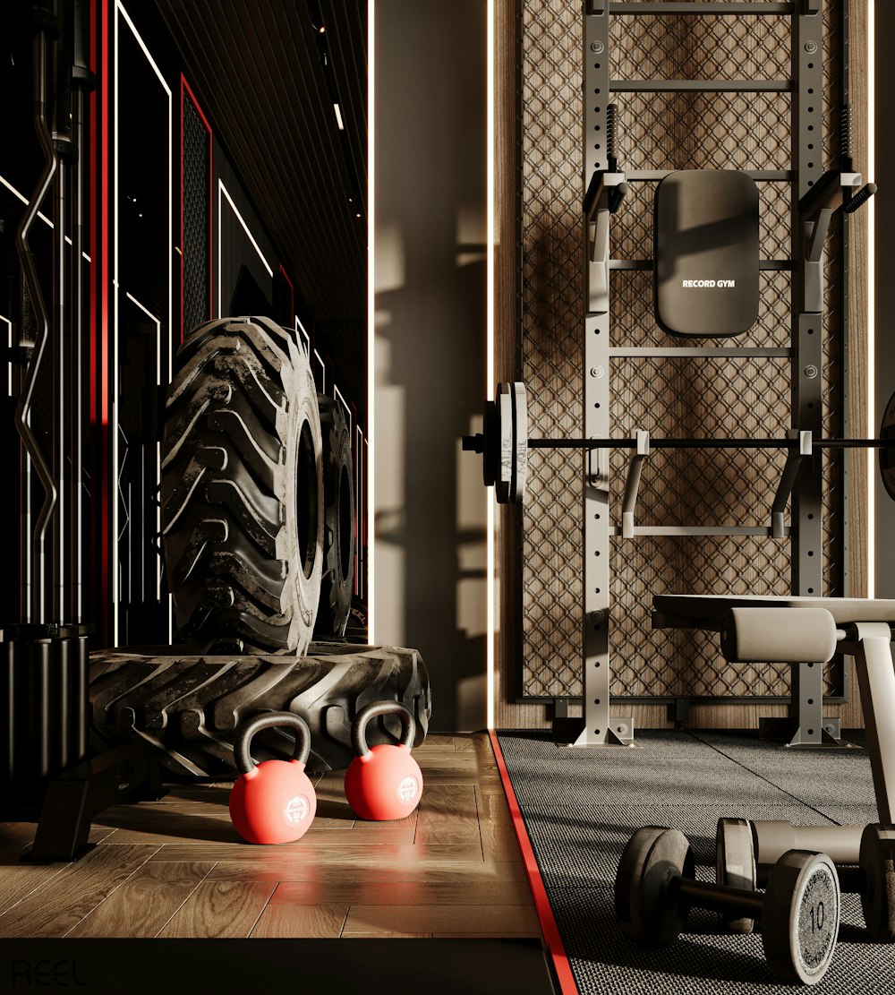 a gym with a row of exercise equipment