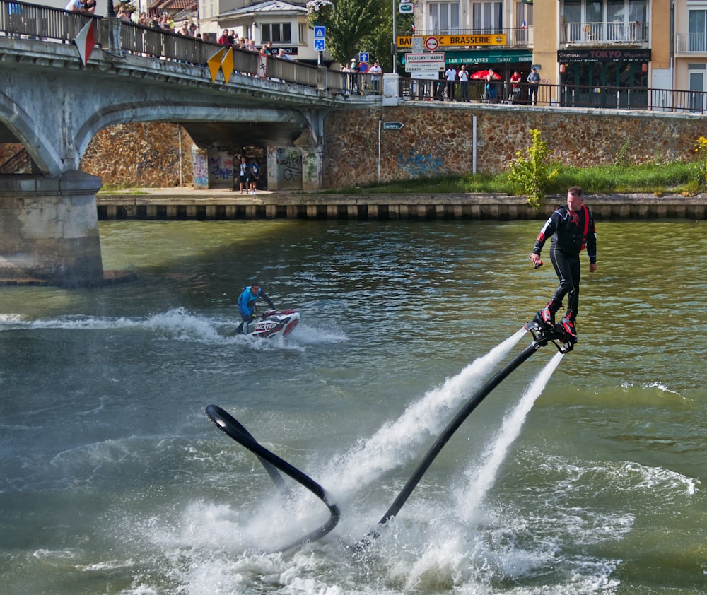 a man on water skis being pulled by a boat