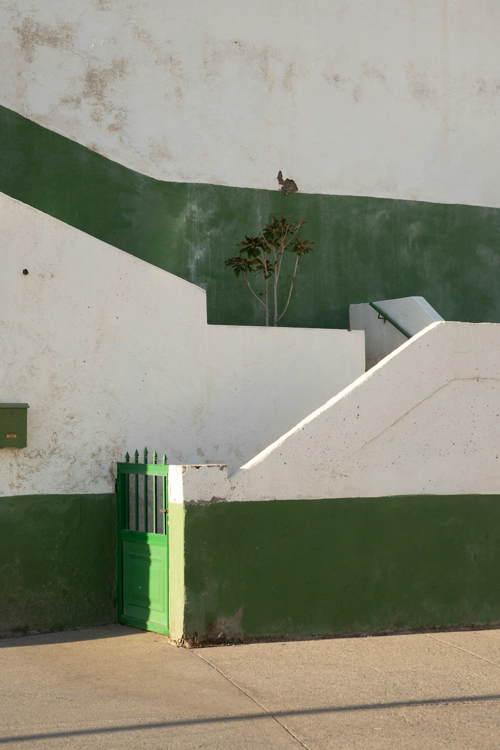 a man riding a skateboard down a cement ramp