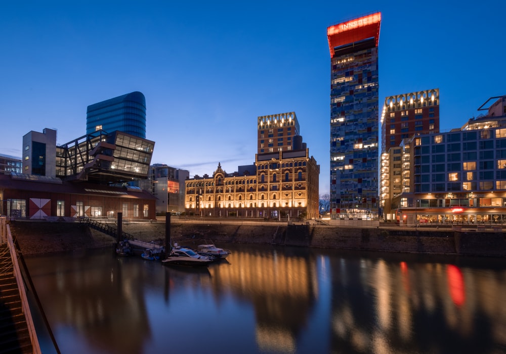 a body of water surrounded by tall buildings