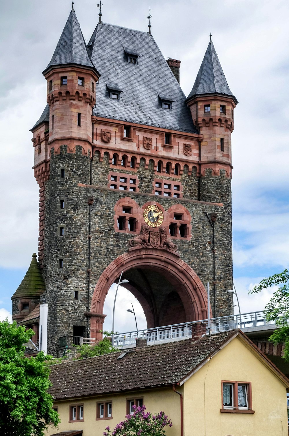 a tall tower with a clock on it's side