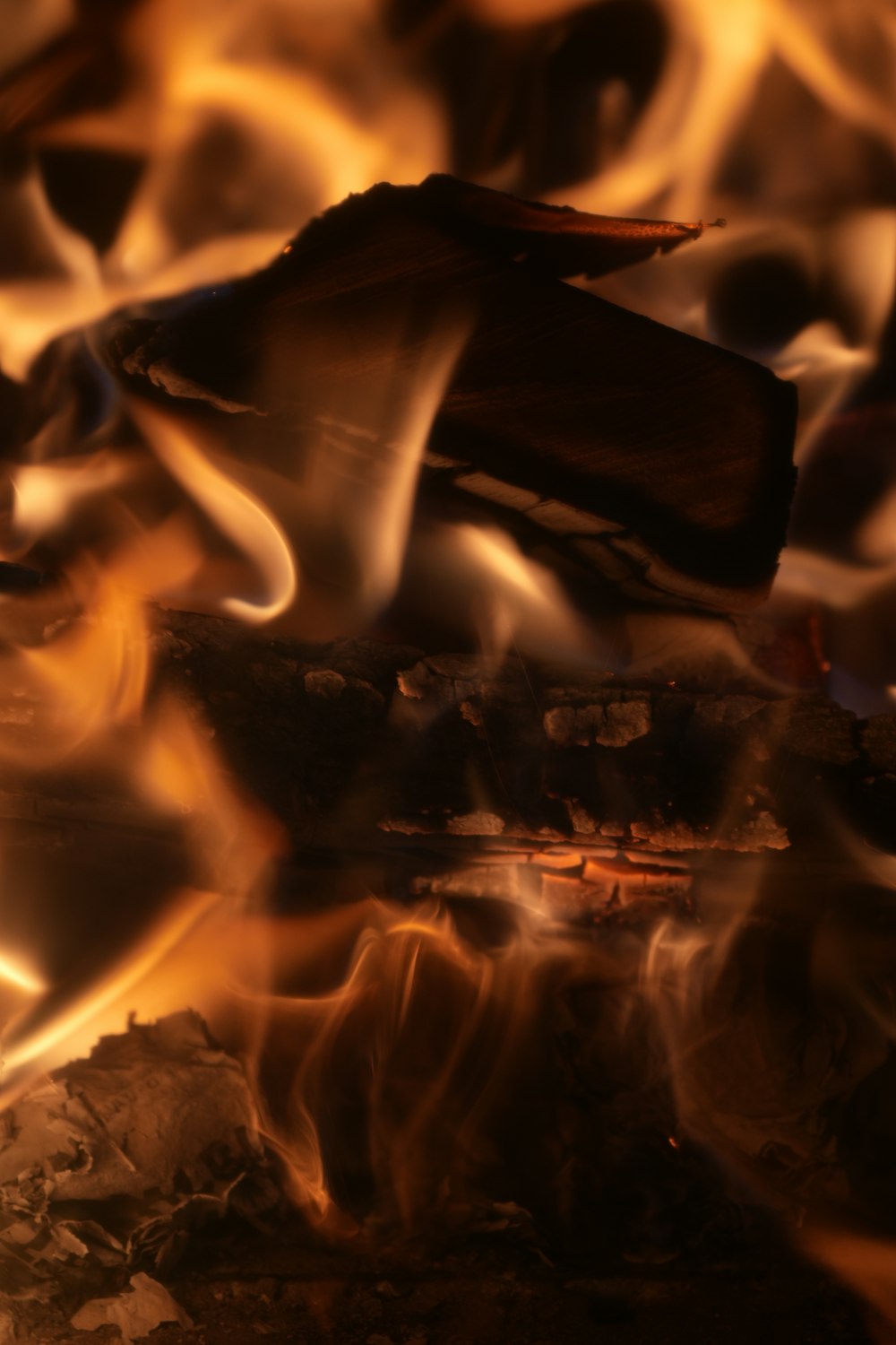 a close up of a fire burning in a fireplace