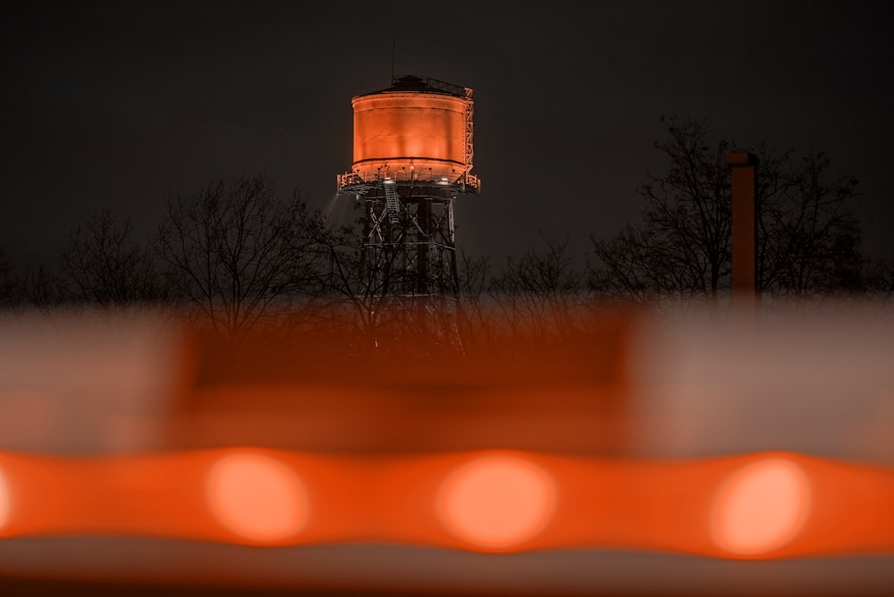 a tall tower with a light on top of it