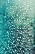 a close up of water droplets on a window