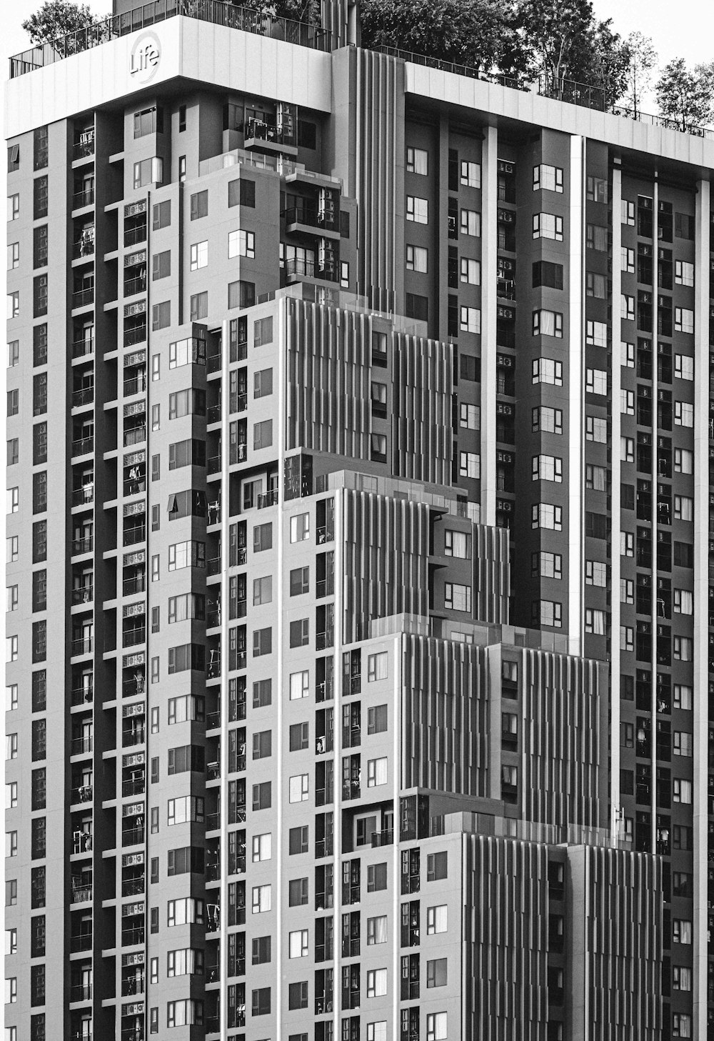 a black and white photo of a tall building