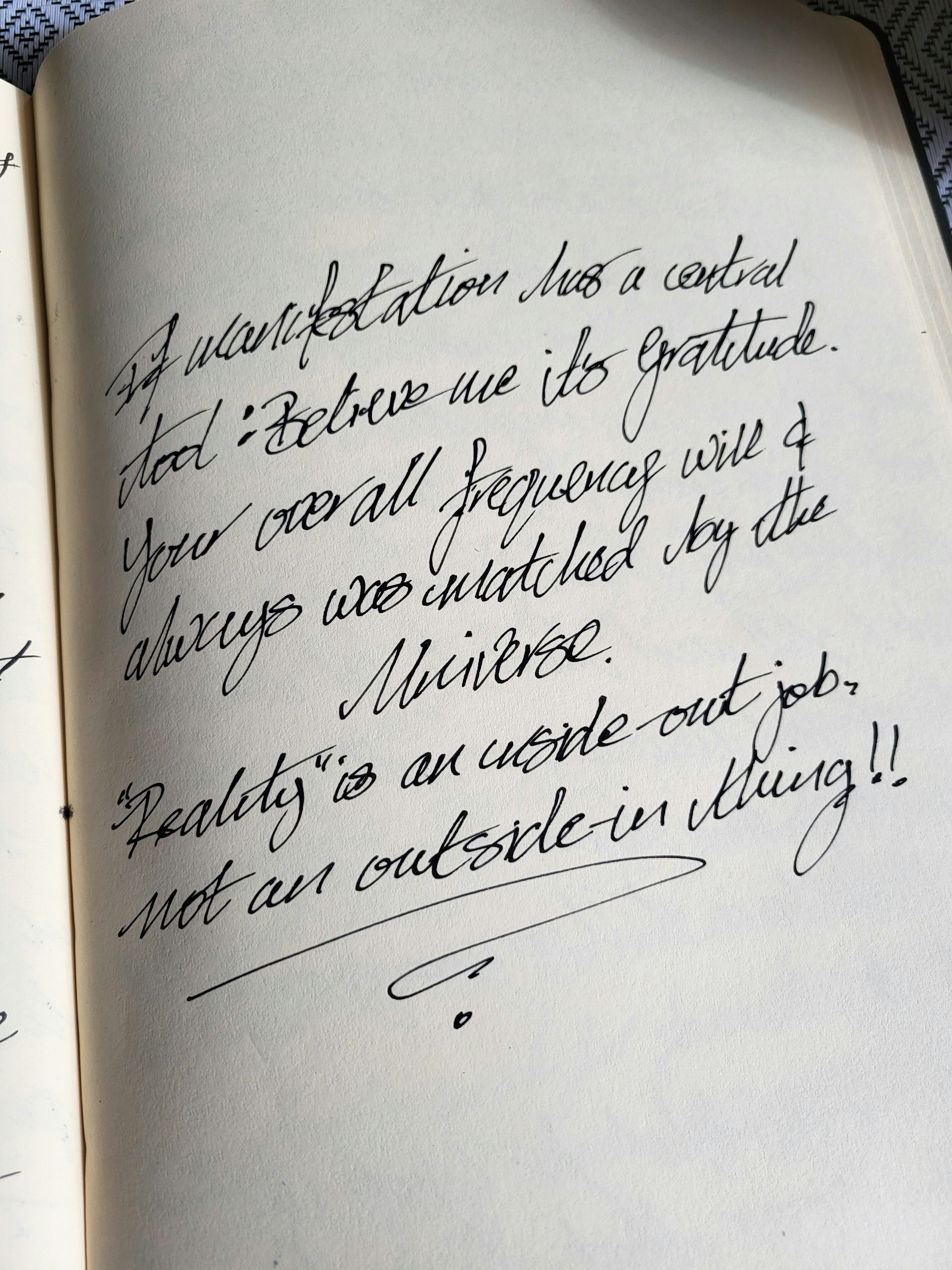 an open book with writing on it